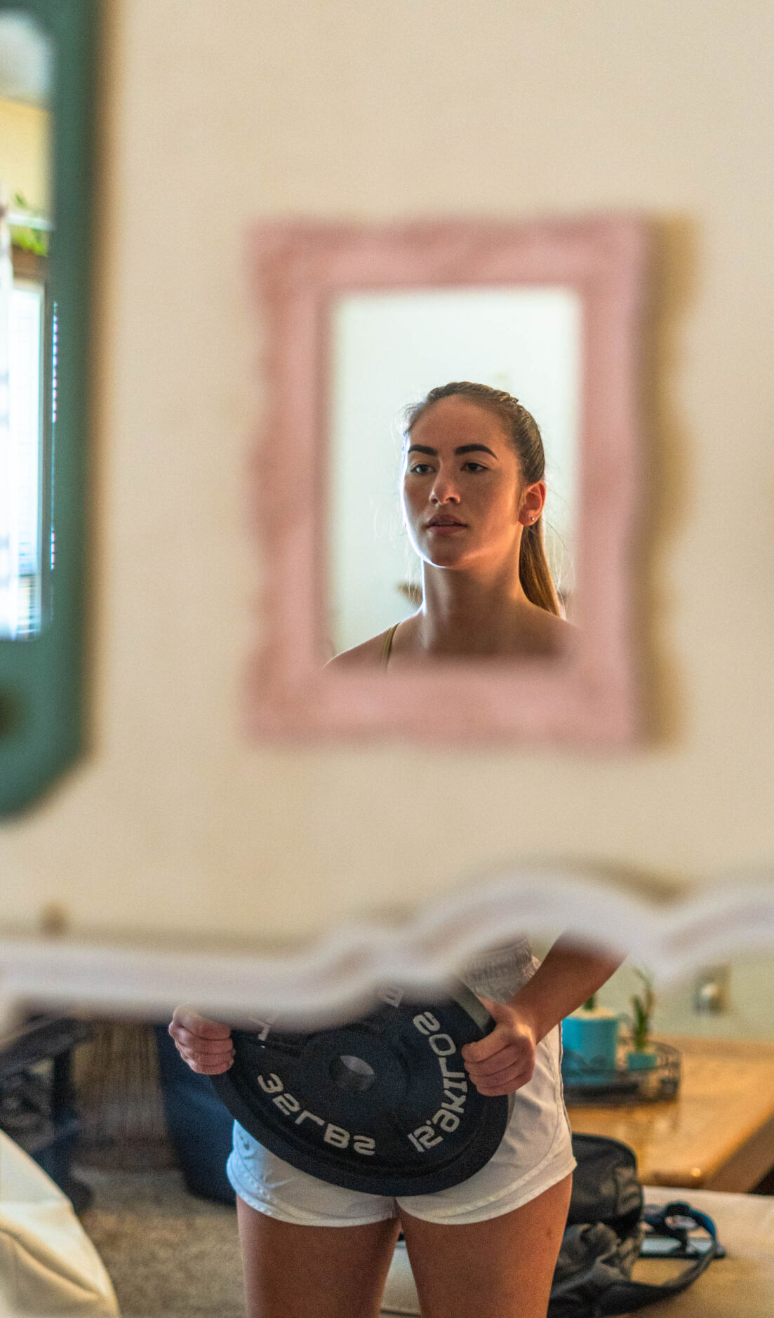 Daisy Levin pauses during workout
